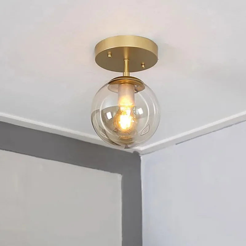 Aurelle Glass Globe Ceiling Light Mount Minimalist Design With Clear Globe And Sleek Metal Holder For Modern Interiors