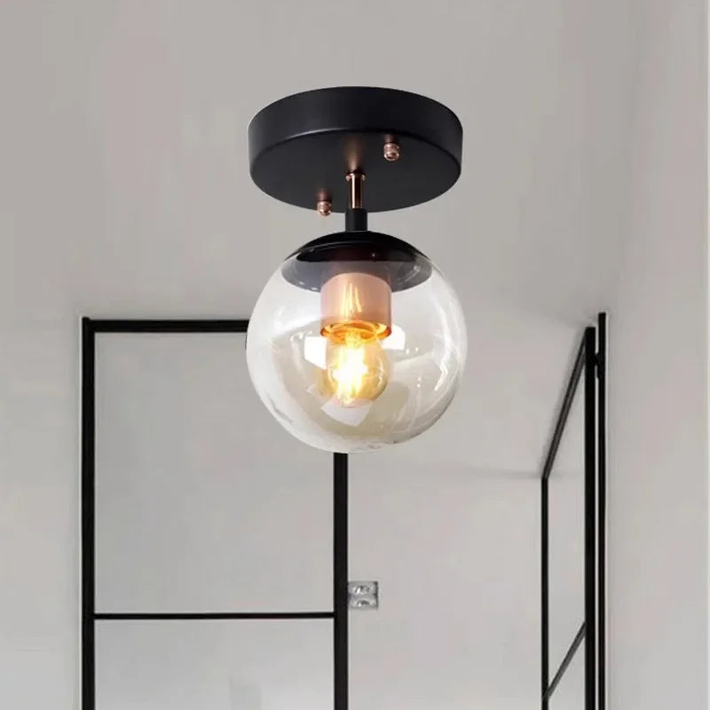Aurelle Glass Globe Ceiling Light Mount Minimalist Design With Clear Globe And Sleek Metal Holder For Modern Interiors